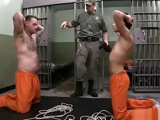 Prison guard tortures and dominates the new guy 