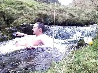 Hot guy spends and hour in a cold Scottish waterfall 