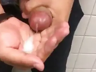 Public toilet teaser guy eats his own cum