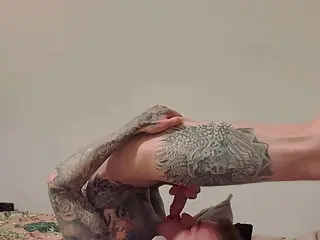 Hot tattooed guy gives self blowjob and eats his own cum