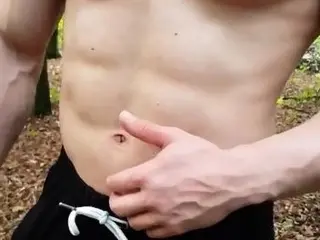 Masked muscled stud solo masturbates outdoor and cums