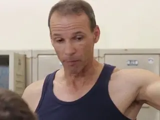 Mature gay teaches youngster how to fuck in the locker room